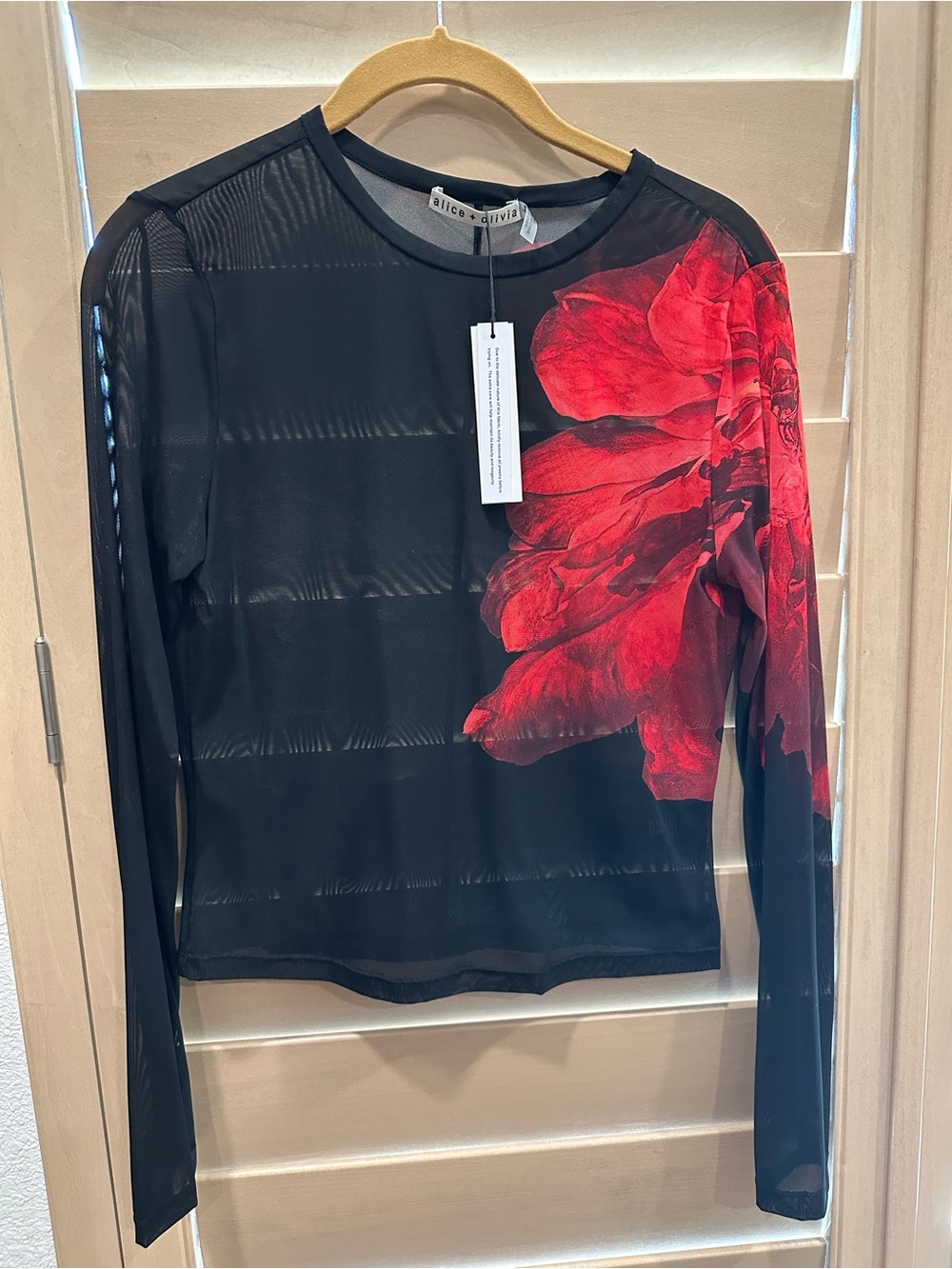 Alice + Olivia Black Long-Sleeve Sheer Top with Red Floral Accent